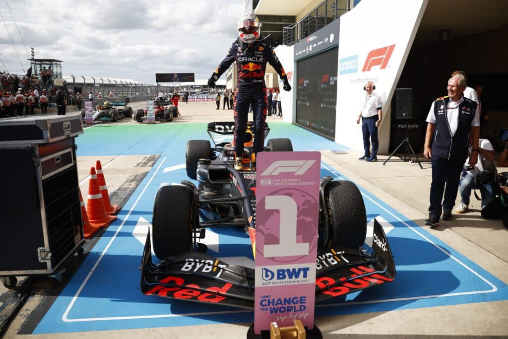 Red Bull driver standing on car in parc fermé after qualifying