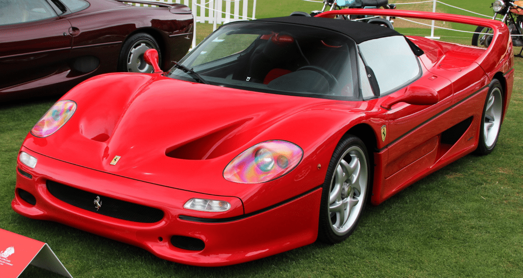 Red Ferrari F50 at a classic car show