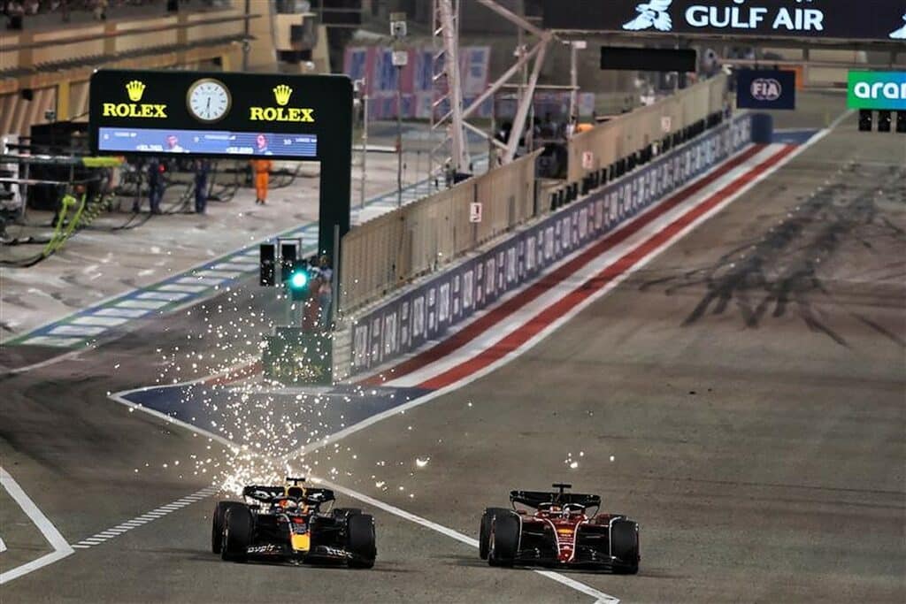 Max-Verstappen-and-Charles-Leclerc-battling-at-2022-Bahrain-Grand-Prix.v1